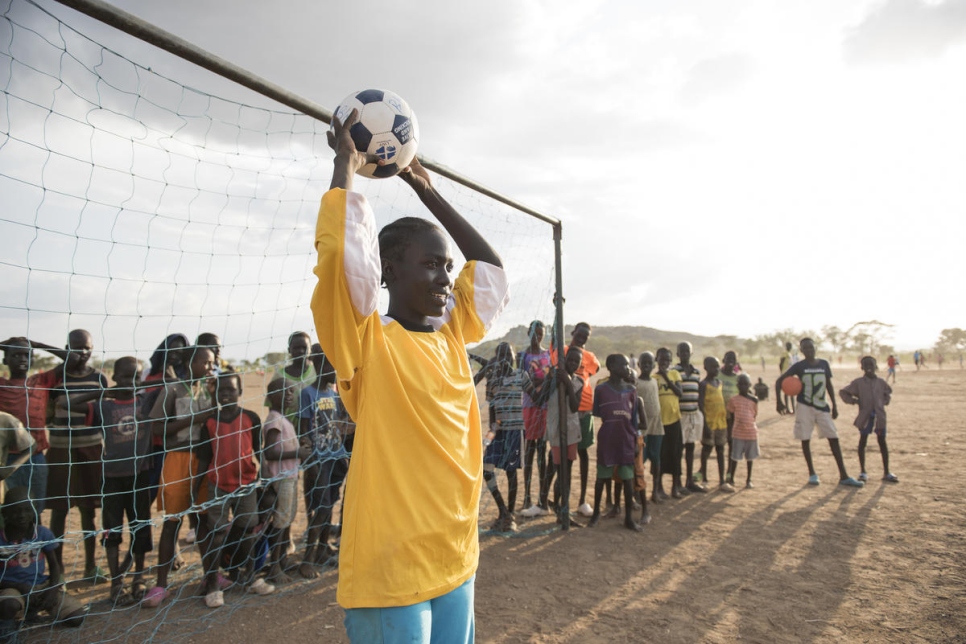 Kenya. Margaret Monday Dominic, 15 plays football with her friends and classmates
