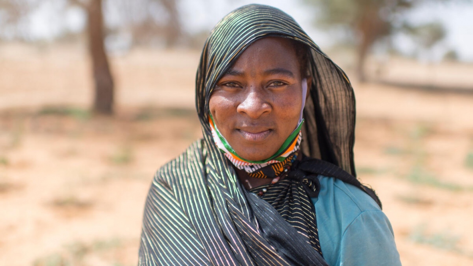 Rabi Saley, 35, who fled Mali after attacks on her hometown Menaka, has been working in Ouallam's market garden since 2020. 