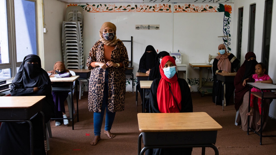 Naima teaches an English class to Somali refugee women at the Somali Women's Association Malaysia centre in Kuala Lumpur. 