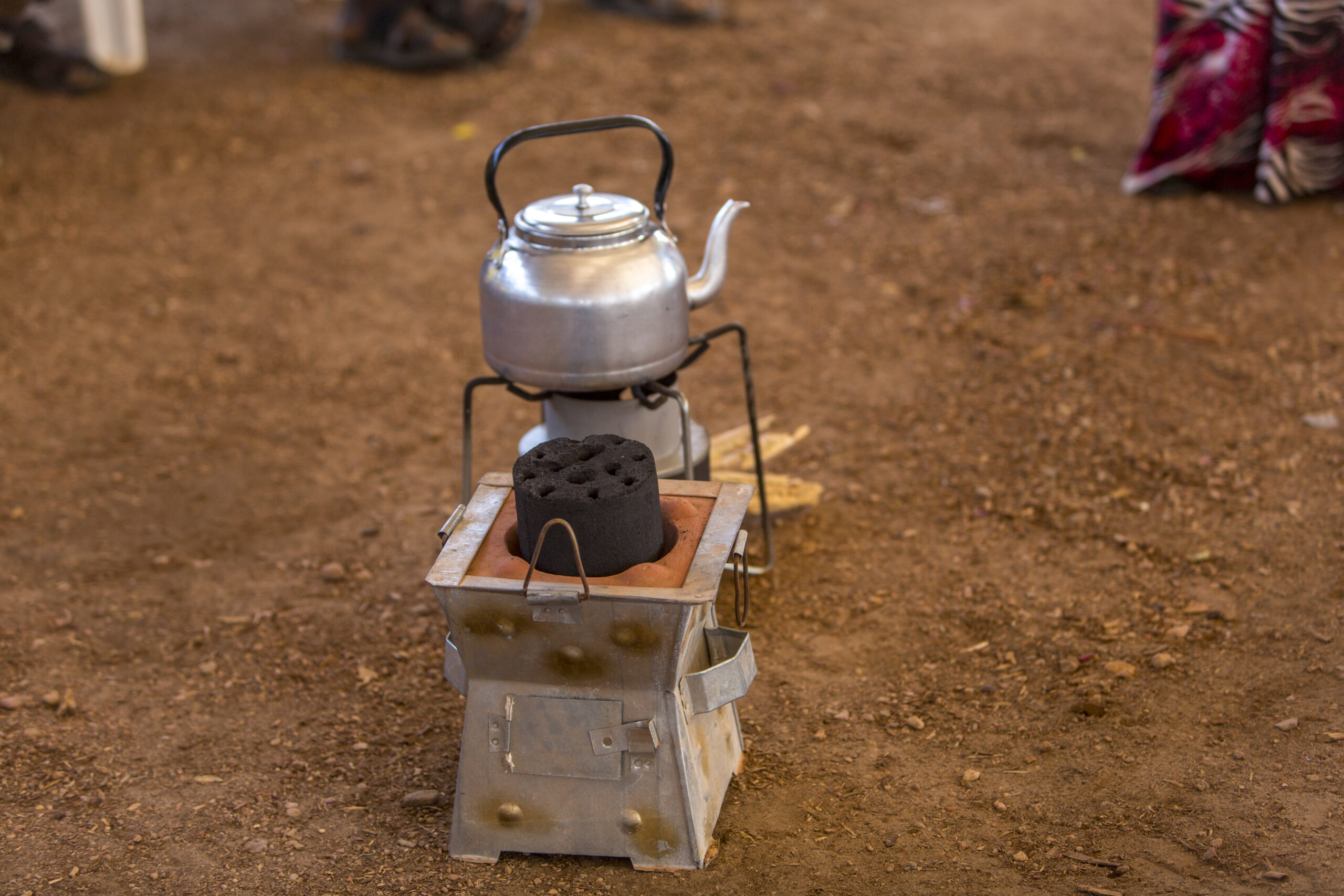 On mission to Ethiopia's Somali region, UNHCR Chief Filippo Grandi was given a demonstration of how the Prosopis Firewood Processing and Charcoal Briquette Production Scheme in Melkadida Camp provides alternative fuel options to reduce deforestation and pollution. © UNHCR/Georgina Goodwin