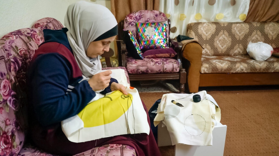 Zuzan Mustafa, 36 from Aleppo, Syria, fled with her husband and three children to Jordan. She puts to use her handcrafts to help her husband provide for the family.
