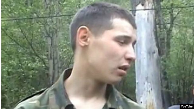 Kazakh border guard Vladislav Chelakh, seen here in a publicly available video, has been charged with the killing spree.