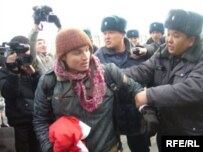 Police detain Maksim Kuleshov during a march in Bishkek in February 2008.