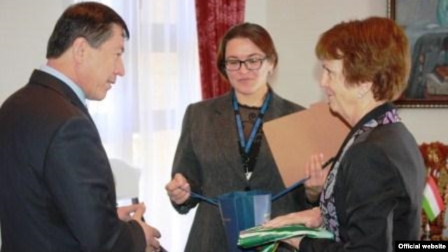 U.S. Ambassador Susan Elliot (right) meets with Tajik Interior Minister Ramazon Rahimov on April 14.