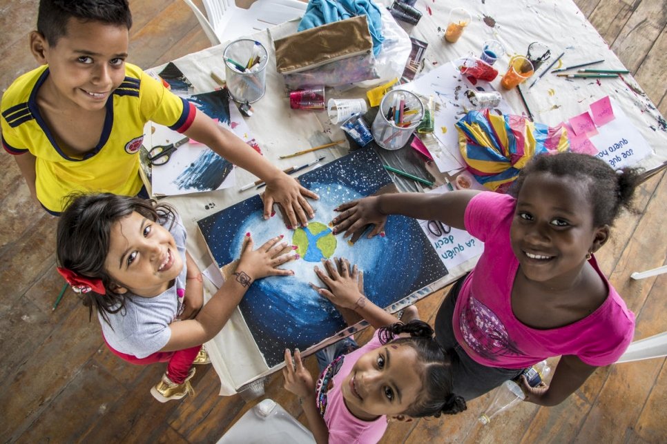 Young refugees and locals paint together in Ecuador