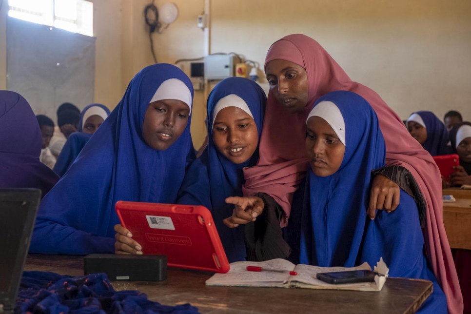 In Kenya refugee students use tablets provided by Vodafone programme