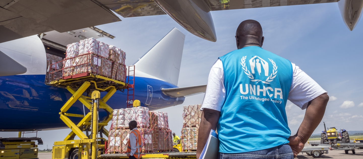 UNHCR, the UN Refugee Agency - Cargo of a Dubai Royal Wings Boeing 747 is being unloaded at Entebbe International Airport in Uganda. The cargo contains 100 tons of emergency aid supplies, including thousands of mosquito nets, sleeping mats, plastic sheeting, kitchen sets and solar lights.