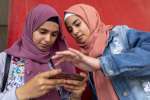 Lebanon. DAFI students play video games on campus in Beirut. Weam (left), 19 years old, is a student in Computer Science (first year) at Lebanese University (UL). She is from Dara'a, Syria and arrived in Lebanon in 2015. On the right is Weam's friend, Diala, a first-year Biology student.