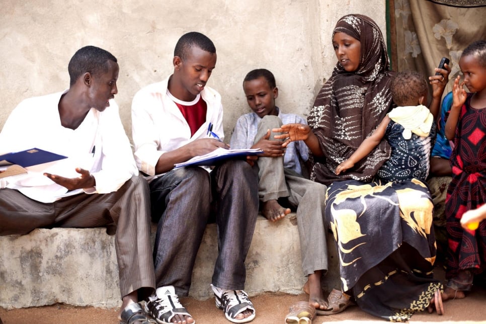 Kenya / Somali Refugees / Hagadera Dadaab Camp / School teachers on their break were recruited as data collectors for the nothing but nets mosquito net coverage surveys. Here the data collectors interview the head of household. / UNHCR / S. Hoibak / December 2010