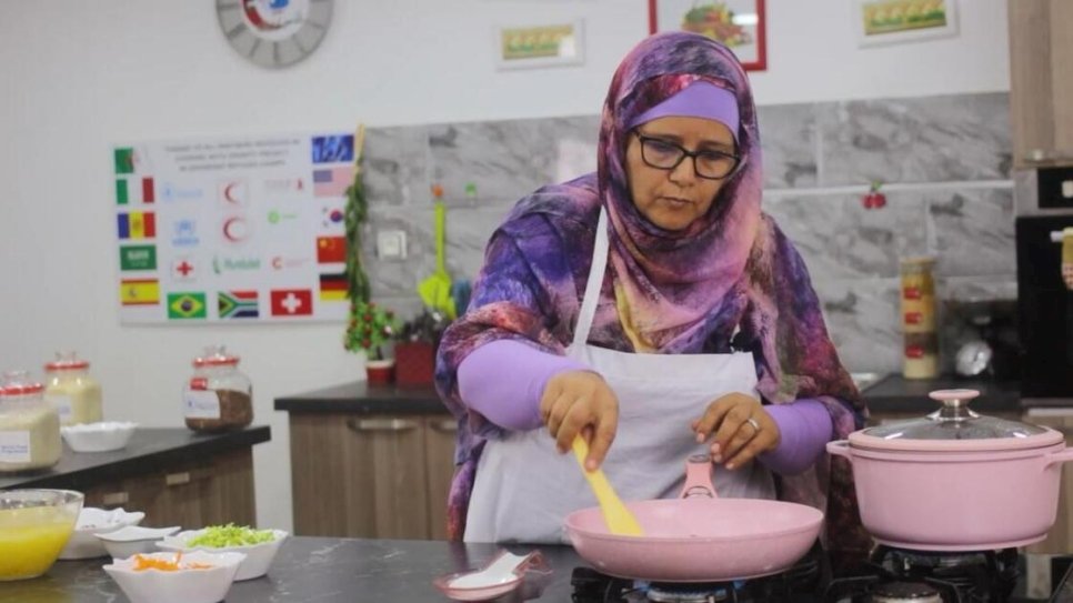 Algeria. Min Chwai (with few ingredients we make meals) refugee TV cooking in Sahrawi camps.