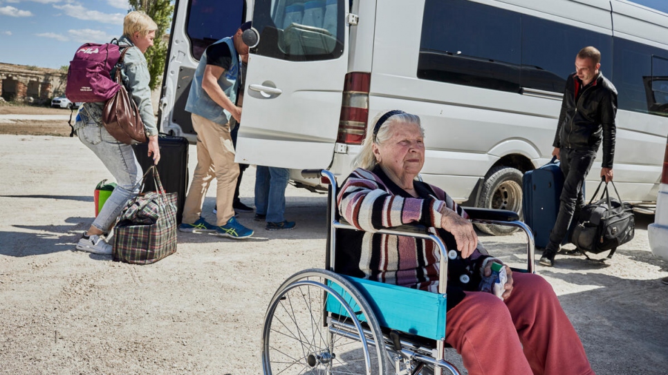 Svetlana waits to board a bus near the Ukrainian border to take her to the Moldovan capital, Chisinau.