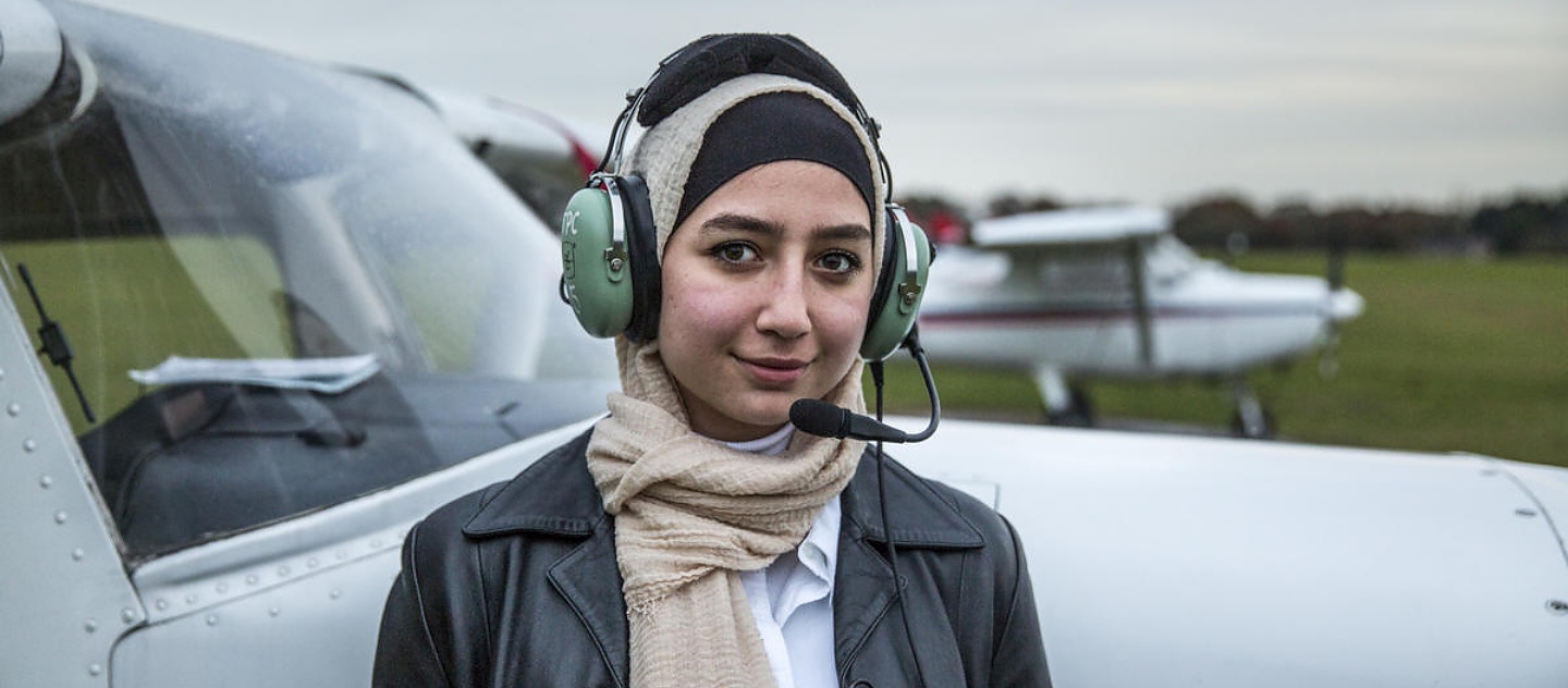 Maya Ghazal, 20, pictured after her first solo flight, at The Pilot Centre, in Denham, United Kingdom. 