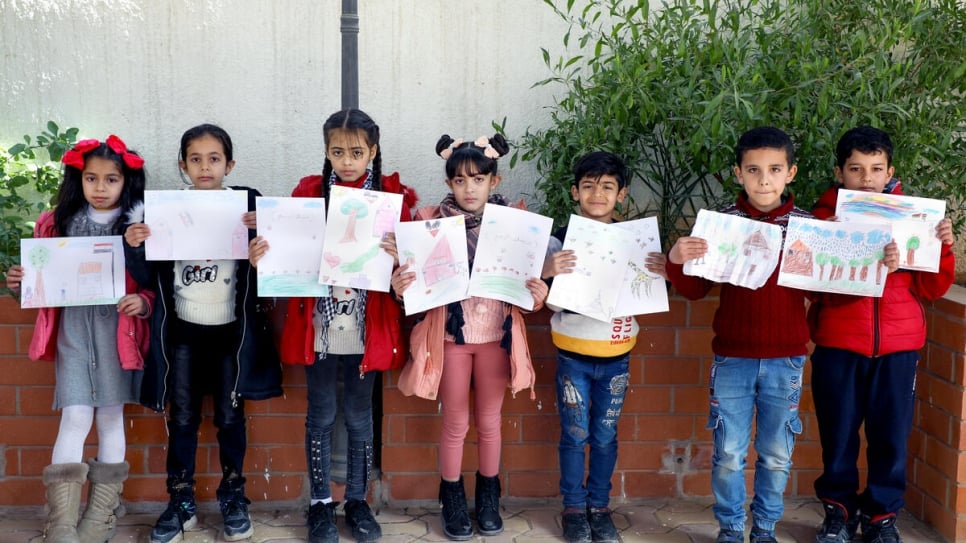 (L to R) Marah (9), Mais (7), Noora (10), Sajida (9), Aous (7), Ahmed (8), Ahmed (8) at a community centre in Madaba, Jordan.