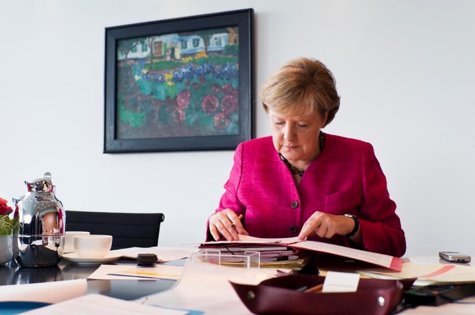 Dr. Angela Merkel, then Federal Chancellor of Germany, works in her office at the Federal Chancellery building in Berlin in 2011.