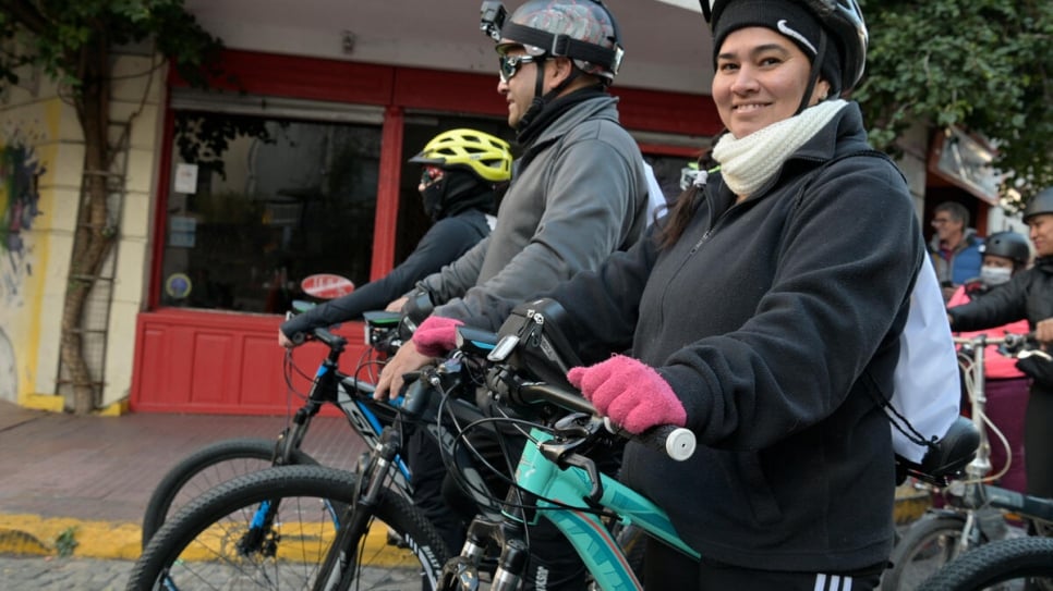 Lisbeth, who arrived in Argentina two and a half years ago with her family from Venezuela, takes part in a World Refugee Day bike ride in Buenos Aires.