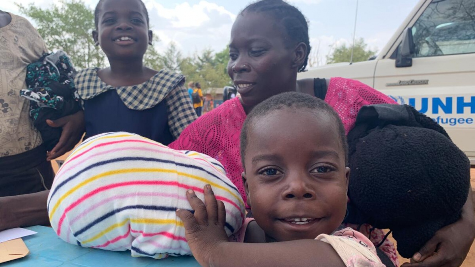 Clementina and her family receive new clothes. 