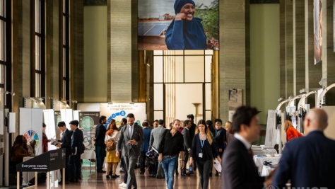 Participants at the first Global Refugee Forum walk through the Salle des Pas Perdus in the Palais des Nations.