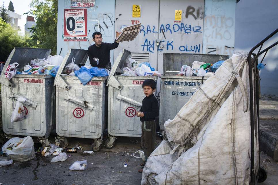 Uday sometimes misses out on school, which he attends, to help his father gather recyclables.