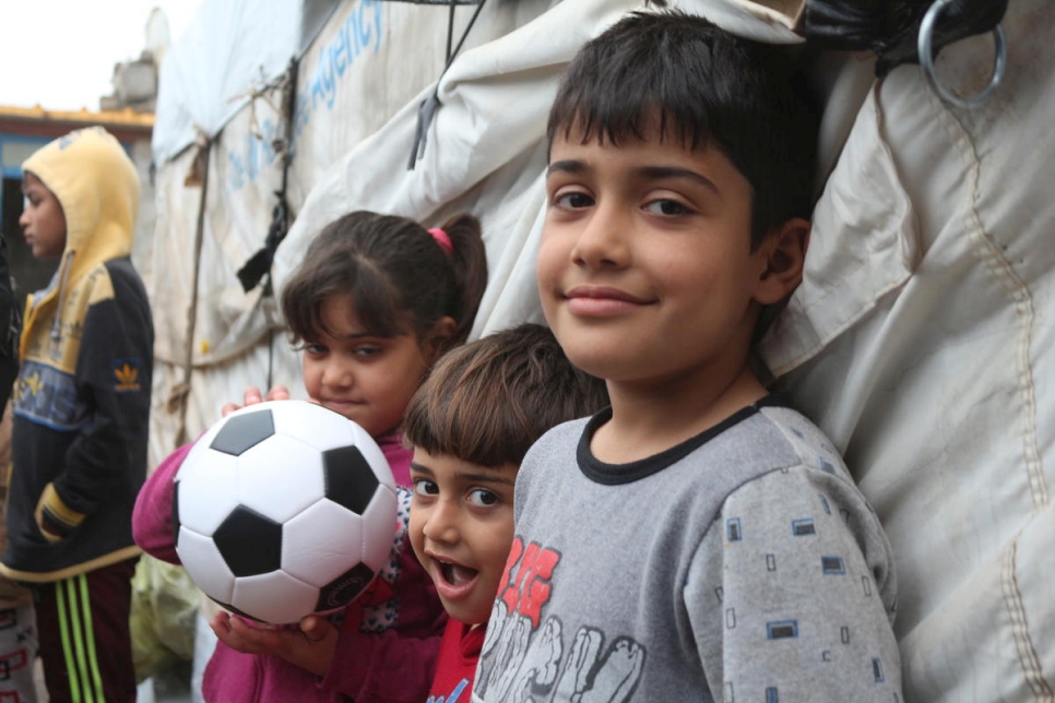 Iraq. Displaced family given shelter on return to damaged village