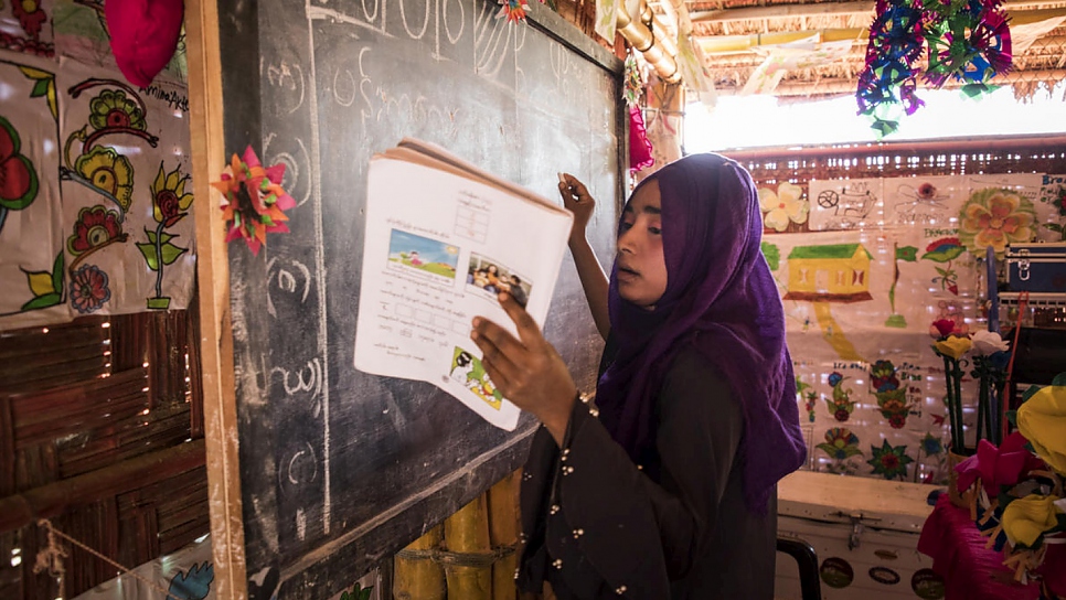 Nazmun Nahar facilitates a class at Naf Adolescent Club.