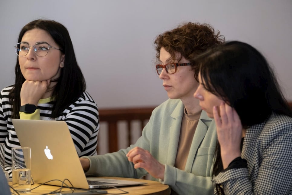 Ilona (centre) takes part in a training for staff who will work in the cash enrolment centre in Warsaw. 