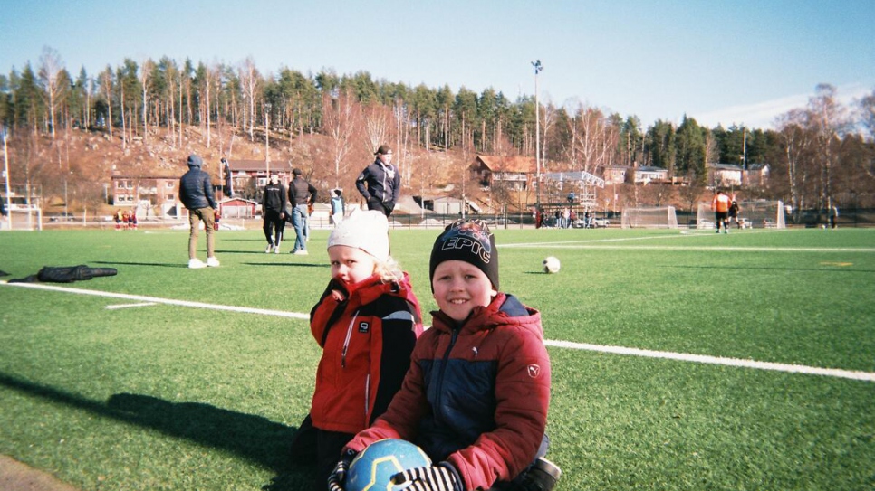 Boys and girls practice their football skills in Hudiksvall, Sweden, in spring 2020.