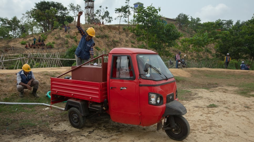 The new three-wheeled fire trucks are better suited than traditional fire trucks to the narrow paths that criss-cross the camps. 