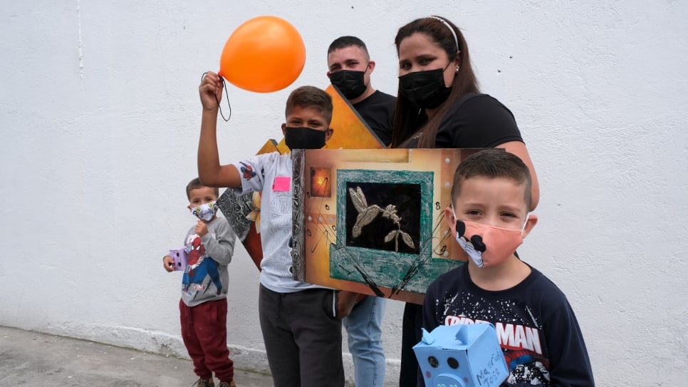 Artistic Venezuelan family finds hope in regularization