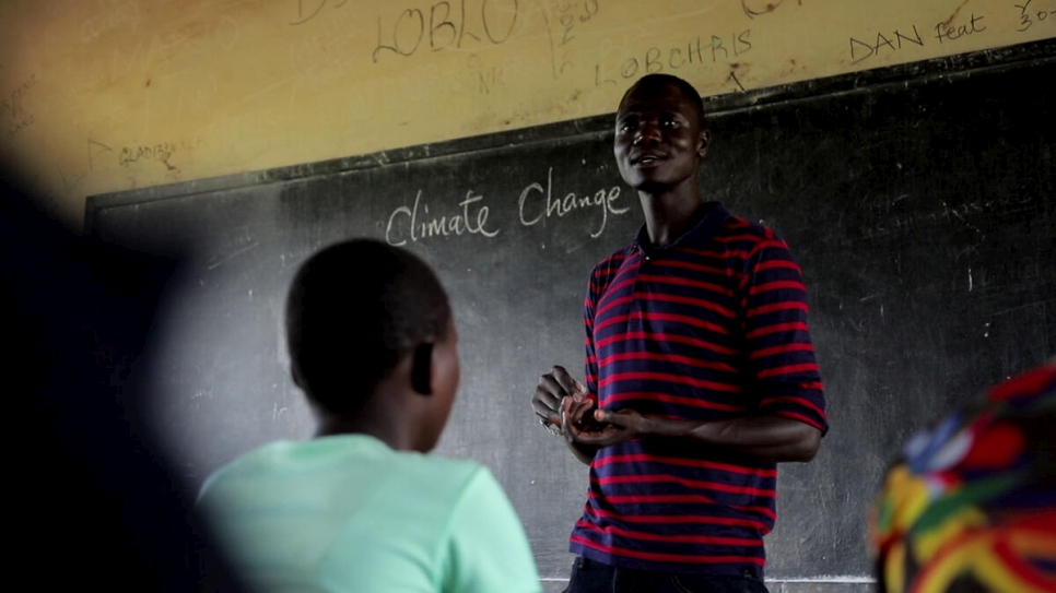 Uganda. South Sudanese refugee plants trees in Uganda to beat climate change