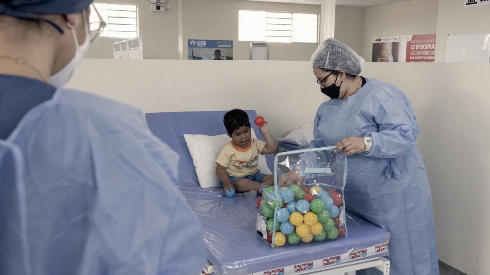 Jeremy Burgos Ramos, a 7-year-old Peruvian boy, is taken through a physical therapy session at the rehabilitation centre.