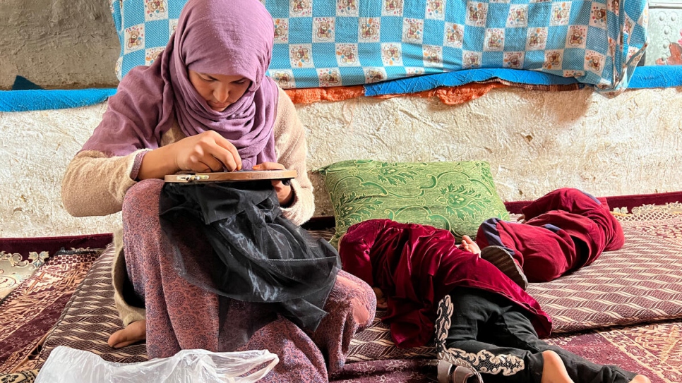 Cash support from UNHCR is helping Fatima and her children get through winter.