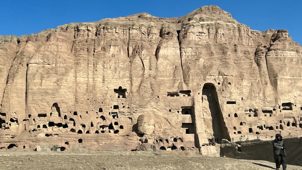 The cave where Fatima lives with her children is built into cliffs where two giant sixth-century Buddha statues once stood.