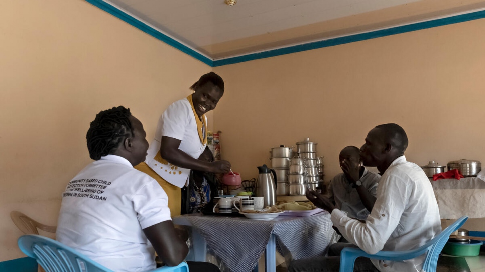 Rose serves breakfast at her restaurant. She spent a decade as a refugee in neighbouring Uganda before returning to Magwi. 