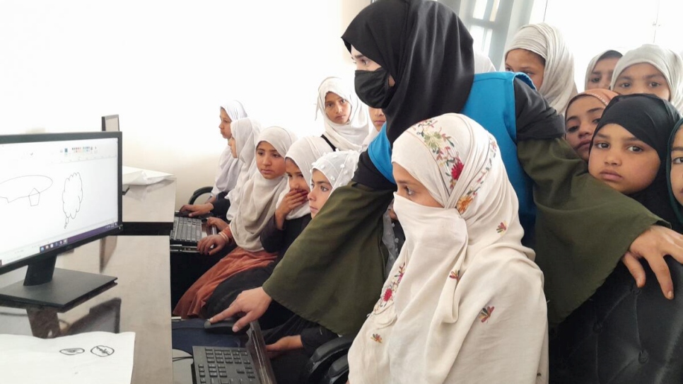 Afghanistan. Former refugee, now volunteer teacher, helps other Afghan girls get an education