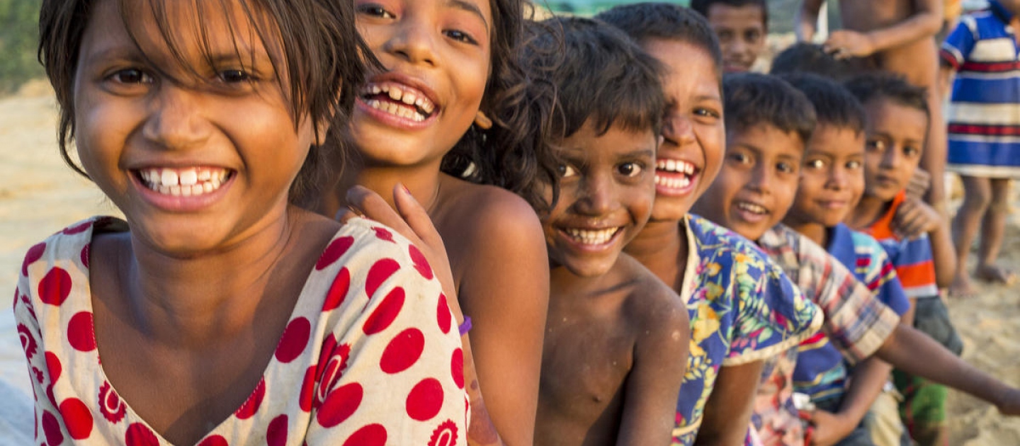 Young children pose for a photograph in Camp 4 Extension, Kutupalong Refugee Camp, south-east Bangladesh.