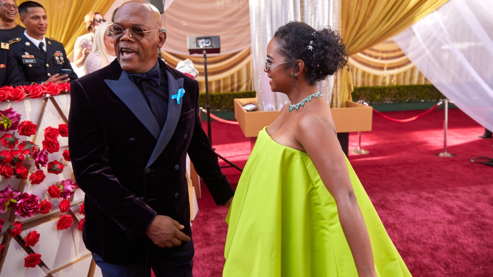Samuel L. Jackson and H.E.R. arrive on the red carpet of the 94th Oscars® at the Dolby Theatre at Ovation Hollywood in Los Angeles, CA, on Sunday, 27 March 2022.
