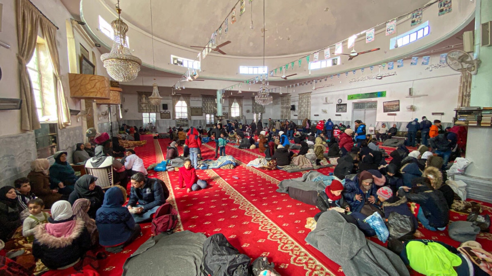 Families shelter inside the mosque in the Suleiman Al-Halabi neighbourhood of Aleppo, Syria.