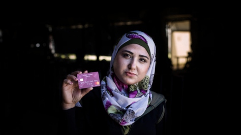 Lebanon. ATM cards during cash distribution