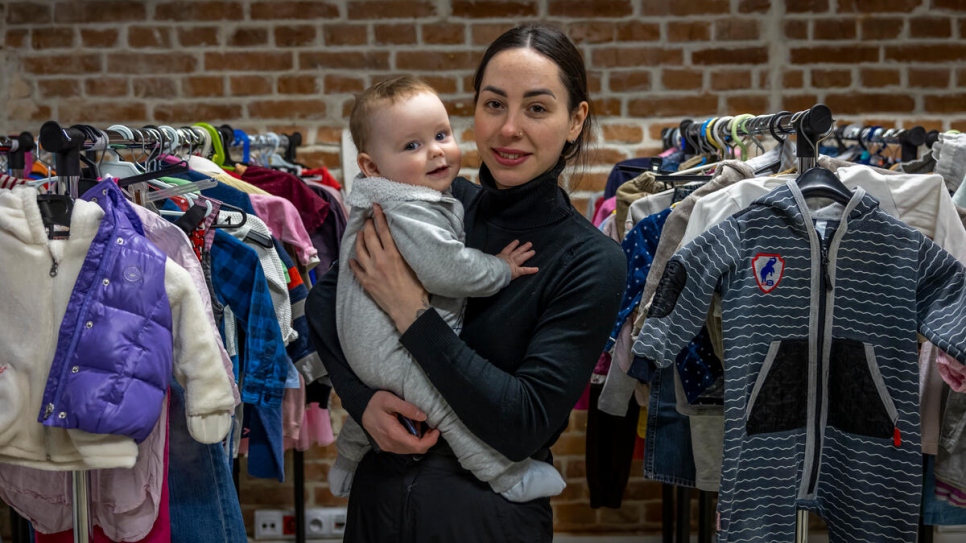 Olha (27) from Dnipro in Ukraine visits the Łagiewnicka Point support centre to find clothes for her son Mykhailo.
 