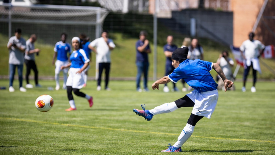 Fatema, who scored five times in 15 games for her country, takes a shot on goal.