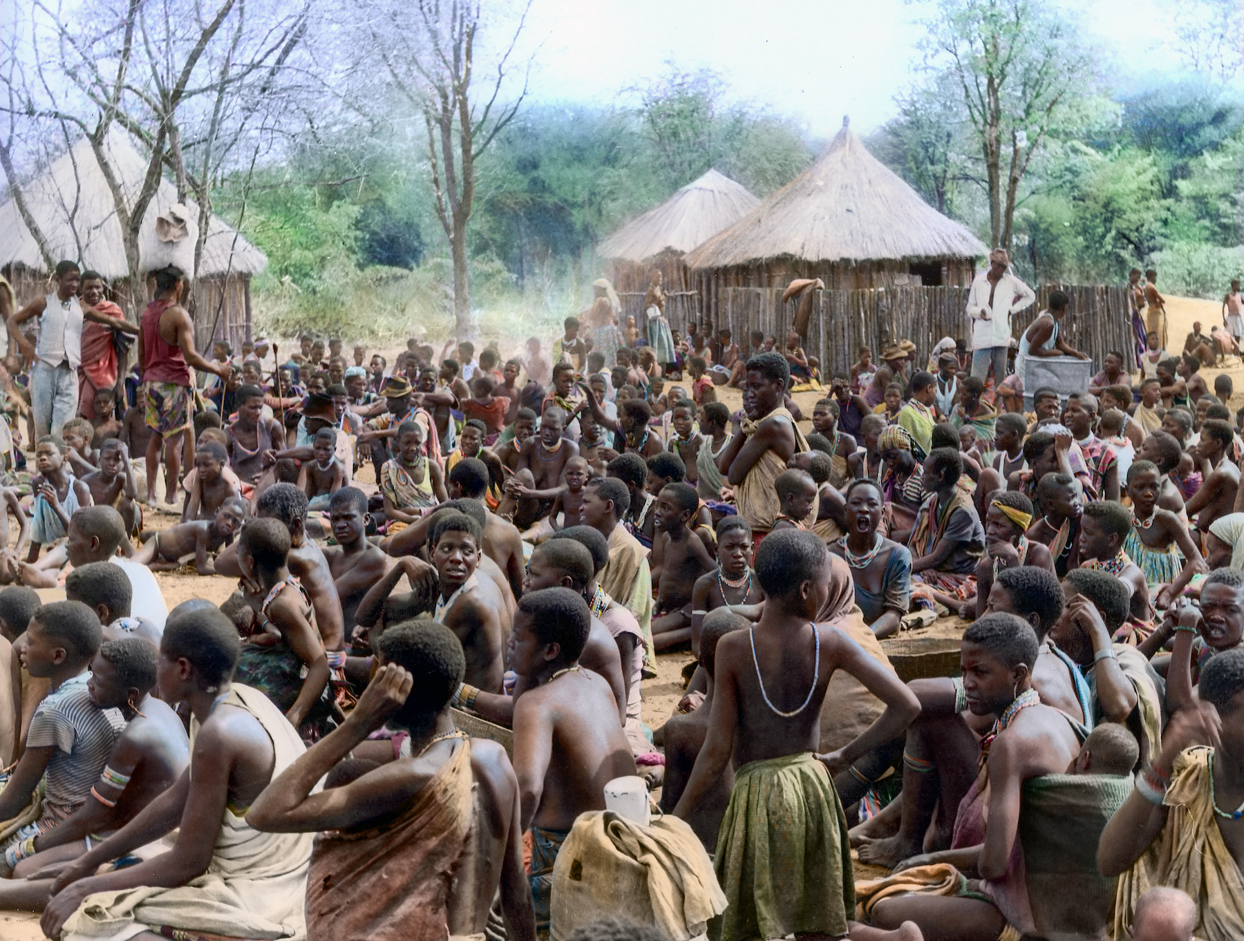 Angolan refugees wait for daily rations in Etsha settlement, Botswana, in 1969. Colourized picture