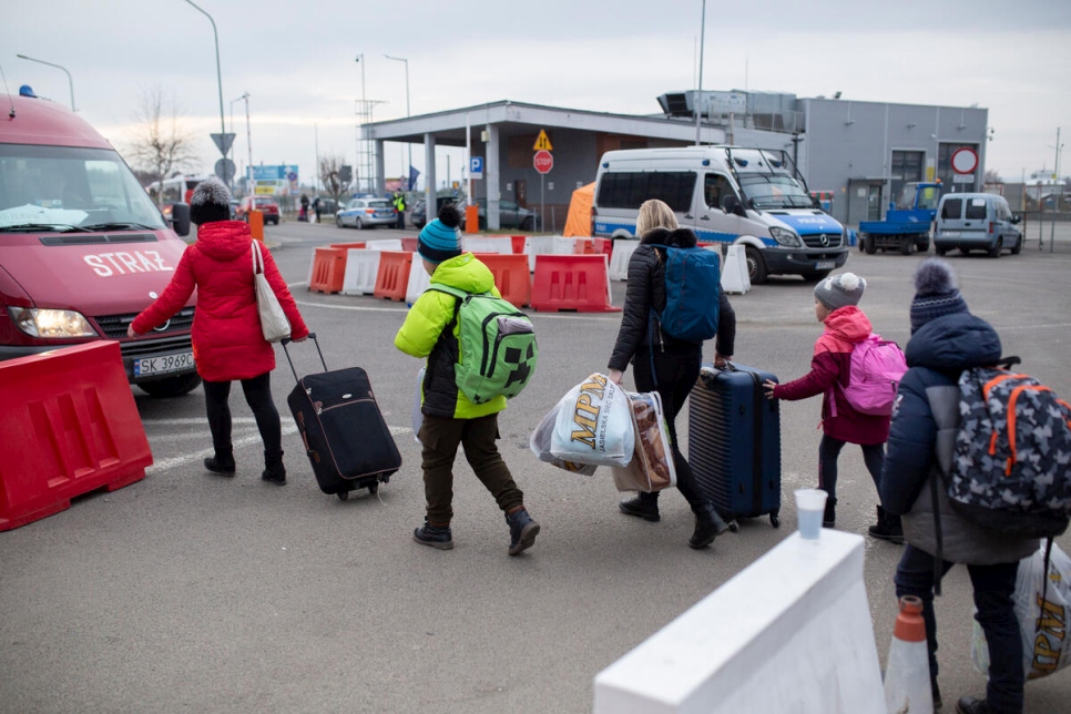 Poland. UNHCR Staff meets refugees from Ukraine crossing into Poland at Medyka border crossing