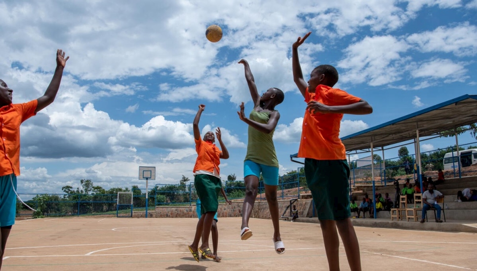 Students play basketball as part of a Sports for Protection programme in Rwanda. 