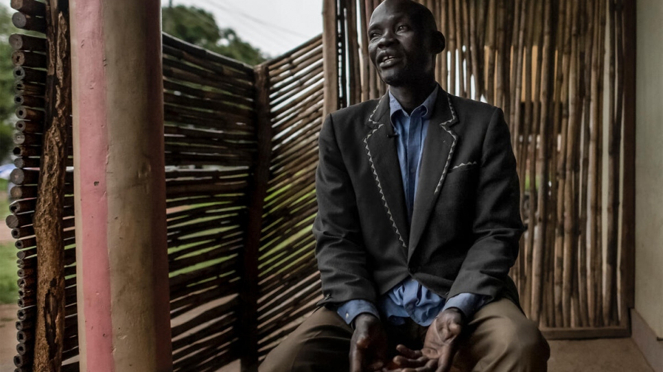 Francis Otto Okumo, a former rebel fighter, at Magwi trading centre where he meets with Rose, founder of the Magwi Payam Women's Association.