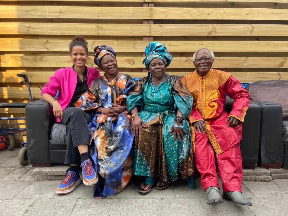 The Netherlands. GWA Gugu Mbatha-Raw meets with Françoise Sabuni and her family, Margheritte Sabuni and Jean Baptiste Sabuni, in Broeksterwald