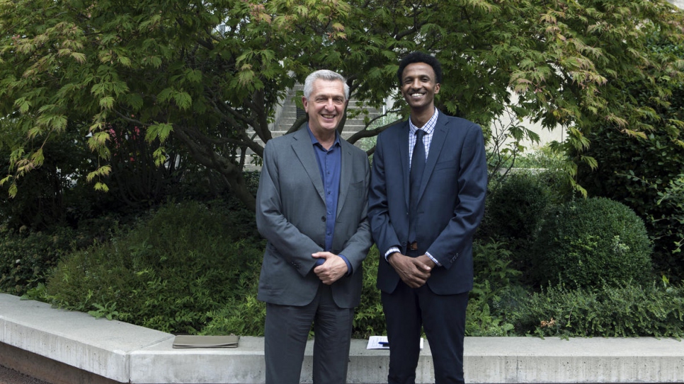 Guled Mire with UN High Commissioner for Refugees Filippo Grandi in Geneva.