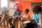 High Commissioner, Filippo Grandi speaks with an Ethiopian refugee boy...