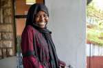 Raba Hakim poses for a photo outside her hostel at the United States I...