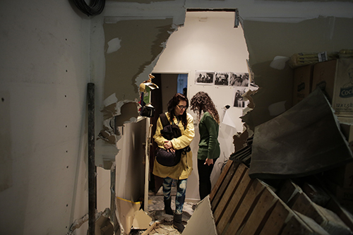 Journalists view the damage caused by a forced entry at the Argentine paper Tiempo Argentino on July 4. (AP/Victor R. Caivano)