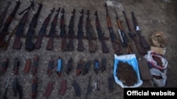 Guns that Armenian's security service says it found in a factory belonging to former Prime Minister Hovik Abrahamian.